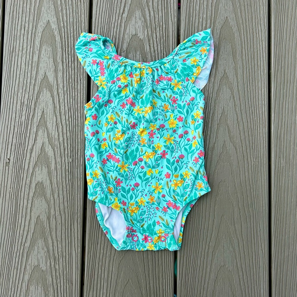 Hatley turquoise, pink, and yellow floral baby swimsuit